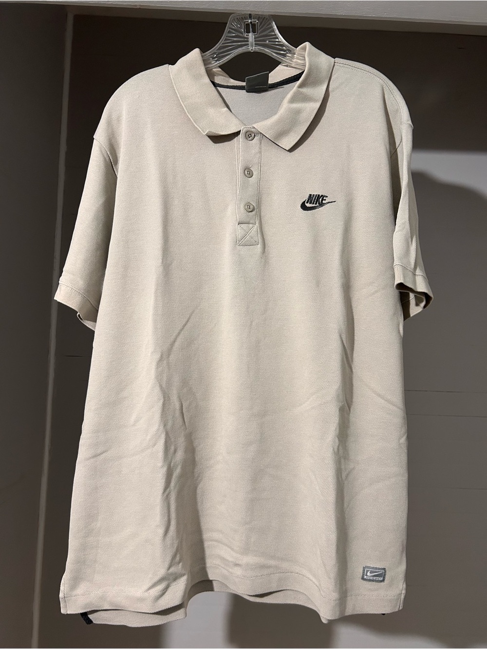 Nike Kids Polo Shirt in Light Beige with Black Logo